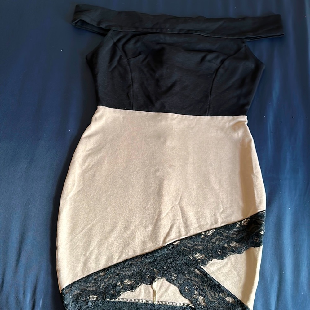 Two color over the shoulder dress! Perfect for an evening out.